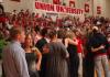 Union students visit, laugh and chat while waiting for the Homecoming game to begin again.  - Photo by Neisha Fuson