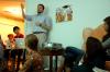 Taylor Worley lectures on Damien Hirst, star of the Young British Artists, in a weekly gathering of the Society for Critical Imagination. - Photo by Matt Elia