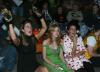 Freshmen Bonnie Clark, Emily Pedan and Morgan Swann cheer and listen to the karaoke singers during Costume Coffee House. - Photo by Stephanie Schroeder