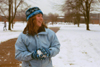 Freshman Heather Phillips enjoys the snow.
 - Photo by Justin Veneman
