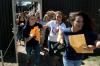 From right:Abby Parker, Hannah Lutz and Rachel Pettigrew dash through Hurt Commons on Sept. 15 to join with their new sorority sisters and completing rush week. Bid day continued with parties celebrating all the new members of the sisterhoods.  - Photo by Kyle Kurlick