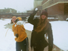 Sophomore Homecoming Maid Sarah Anderson and Junior Homecoming Maid Laura Lee Moore take time to have fun in the snow with friends. - Photo by Justin Veneman
