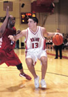 02/58/03 - Junior Mike Simpson looks for an open shot against Martin Methodist.