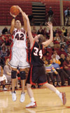 02/58/03 - Junior Ginger Bryant goes for two against Martin Methodist.
