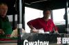 Russell Gwatney and Rick Dalton, head cook, of the Gwatney Chevrolet team stand in their trailer while cooking barbeque for Union University faculty, staff, and students. - Photo by Kristi McMurry