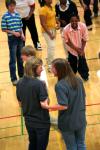 Kelsey Goostree, junior teaching English as a second language major, and Michelle Mangham, sophomore business administration major, help judge the game played during the SIFE event at Union. SIFE directed games, projects, and lunch for kids in the area. - Photo by Kristi McMurry