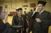 5/17/08 - Music Graduate Austin Clark lightens the mood by telling a joke to fellow music majors Bethany Jenkins and Leandra Brown as they line up for the spring graduation ceremony. - Jordan Buie