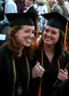 5/17/08 - Julie Mitchell and Kirby Maxwell, social work majors, walk to their families after Spring 2008 graduation. Many students in departments at Union, such as the social work department, show great companionship and closeness. - Kristi McMurry
