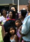 8/2/08 - May Lee Almeria, who received her masters in nursing, spends time with her family from Tampa, Florida after the summer graduation ceremony. - Kristi McMurry