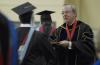 President Dockery hands out diplomas during summer graduation in the Fred DeLay Gymnasium Saturday, August 2, 2008. - Photo by Justin Veneman