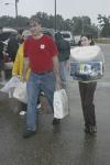 George Guthrie, Benjamin W. Perry Professor
of Bible, and his daughter Amy help freshmen transport their things from the parking lot to their dorm rooms. - Photo by Sarah Palmer