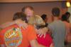 Parents pray with their student as they say goodbye after the Focus evening worship service. - Photo by Morris Abernathy