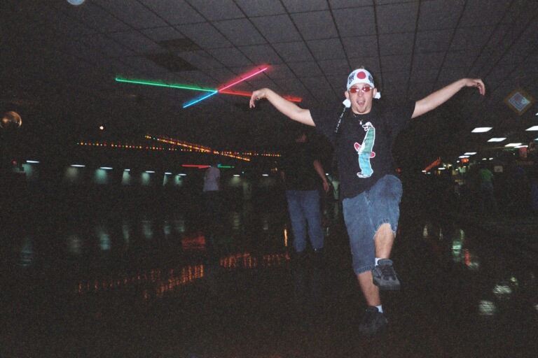 09/5/03 - Andy Buford (dressed as the Karate Kid) does his best dying swan kick during SAC's 80's skate night.