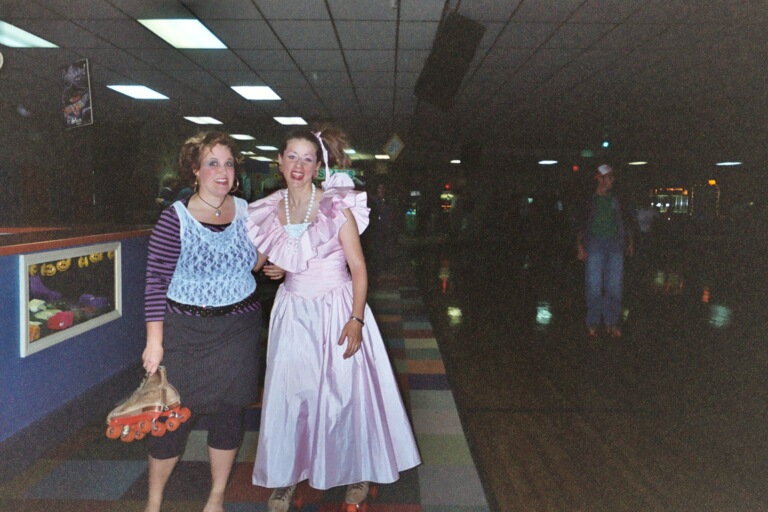 09/5/03 - Freshman Lindsey Abell (in pink) gets crowned Prom Queen during SAC's 80's skate night