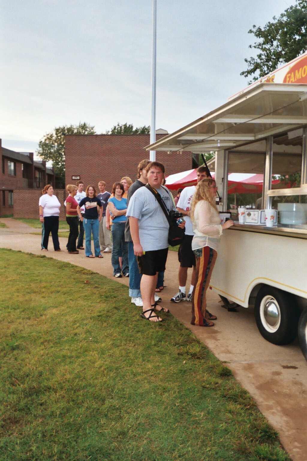 09/13/03 - Jon Blair gets his corn dog at Fall Fest 2003.