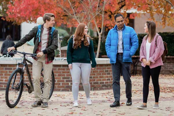 professor with students outside