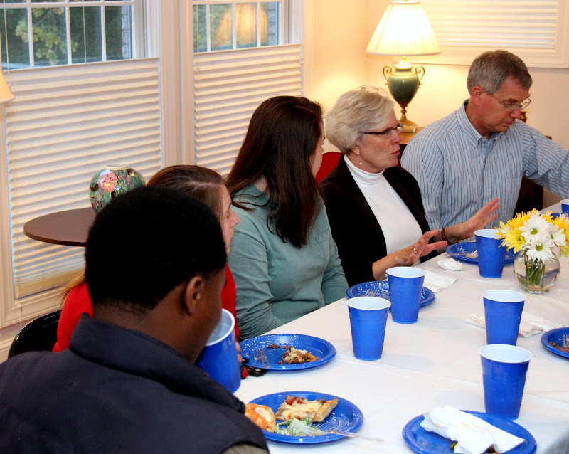 Guests at the Phi Alpha Theta Best Chapter Award pizza party on October 16, 2015, enjoy conversation together during the meal. They are: (left to right) Trae Hall (back to camera), Kathryn Mitchell, Jordan Sellers, Nancy Thomas, and Dr. David Thomas.