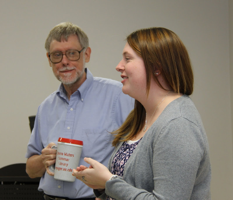 Rutledge Honorary History Club President Kathryn Mitchell talks a bit about the club's history while Dr. Terry Lindley, the club's faculty advisor, listens.