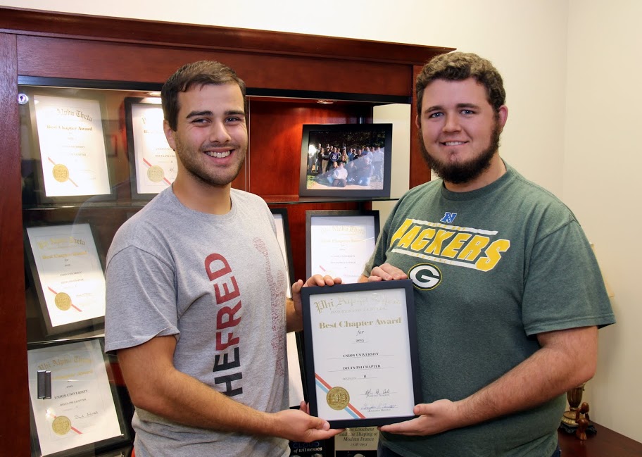 Delta-Psi Chapter President Nicholas Hancock (right) and Vice President Allen Bradley hold the 2015 Best Chapter Award certificate that the chapter received in the mail on September 18, 2015.