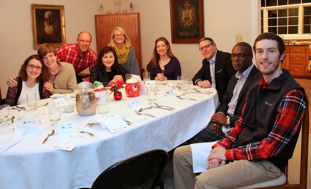 Guests at the history department's French Christmas dinner pause for a photo at the beginning of the meal. They are (left to right, going clockwise) Allison Pulliam, Thomas Gray, Robert Briley, Priscilla Porter, Brenda Briley, Lisa Bates, Dr. Keith Bates, Byron Elam, and Luke Adkins.
