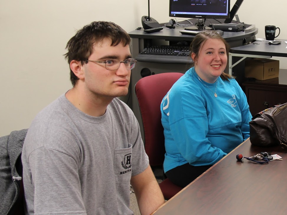 Miles Randall and Kathryn Mitchell enjoy conversation with other club members during the history club's movie night at Union on December 2, 2016.