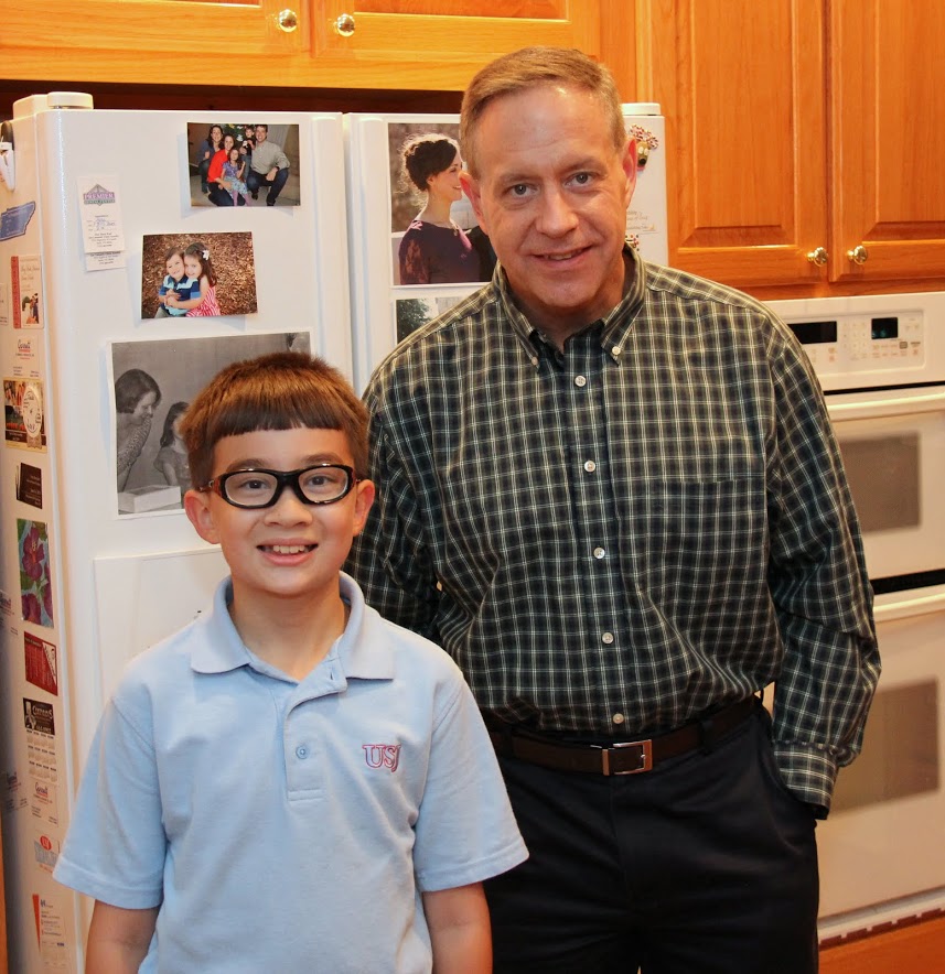 Dr. Henry Allen stands with his son Matthew during the Phi Alpha Theta Best Chapter Award pizza party on October 21, 2016.