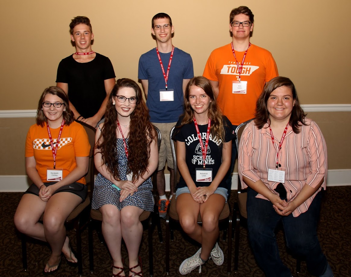 Seven incoming history majors pose for a photo at the New Students Dinner on August 19, 2017. They are: (seated, left to right) SaraBeth Conley, Mikayla Simpson, Rebekah Lisle, and Cheyanne Harber; (standing, left to right) Christian Meyers, Matthew Latham, and Will Lewis.