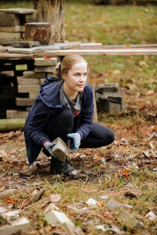 Megan Ledbetter stacks bricks in the Children's Garden at Liberty Garden Park on October 29, 2019. Photo by Kristi Woody