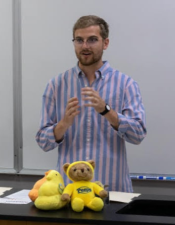 Phi Alpha Theta President Luke Sower leads the business segment of the Delta-Psi chapter's fall plenary meeting on September 24, 2019. Photo by Joey Echeverria