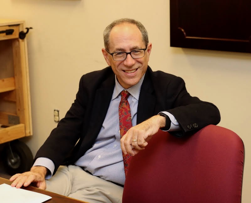 Dr. David Bell relaxes during a coffee time with history department faculty members on the afternoon of October 25, 2021, at Union University.
