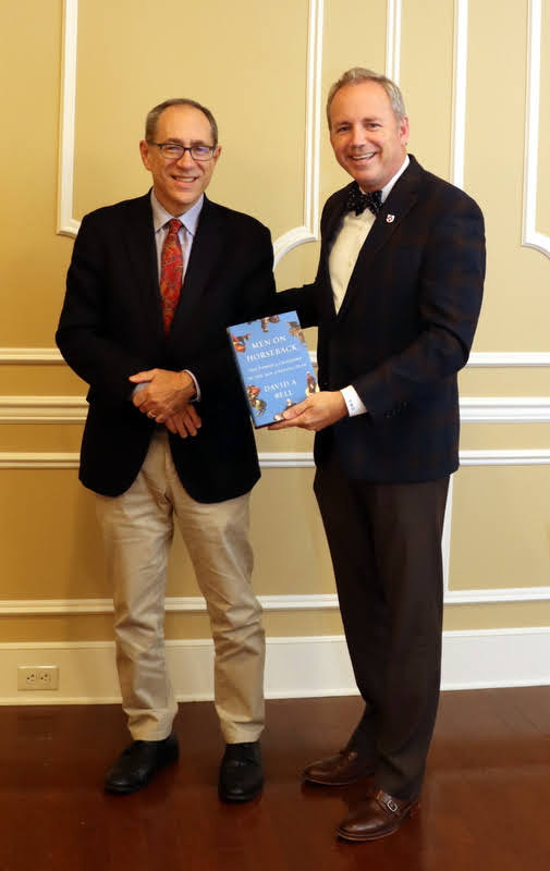 Dr. David Bell (left) stands with Union University President Dr. Samuel W. Dub Oliver after presenting him with a copy of his book MEN ON HORSEBACK at a dinner in Dr. Bell's honor on October 25, 2021.
