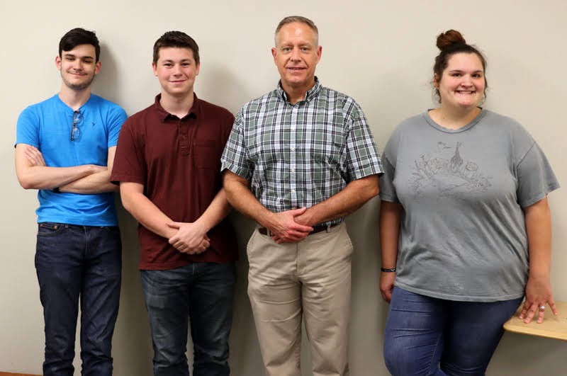 Attendees at the Rutledge Honorary History Club meeting on October 7, 2021,  take time for a photo. They are (left to right) Seth Blair, Noah Kea, Dr. Henry Allen (the club's faculty advisor), and Sandra Allen.