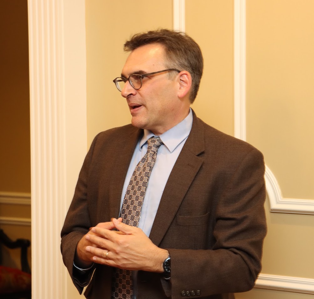 Dr. Michael Neiberg answers a question from an attendee during a brief program at the lectureship dinner in his honor on October 24, 2022.