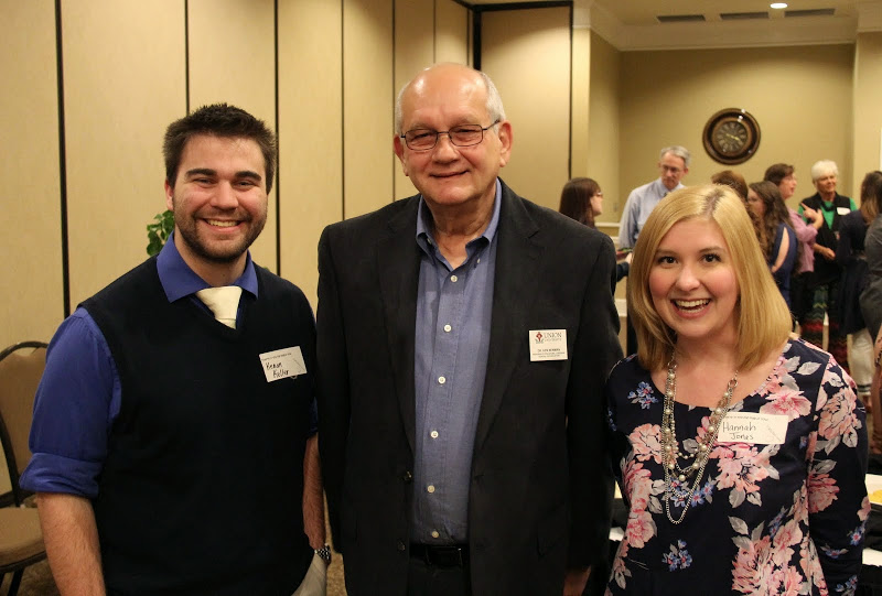 Student history teachers Kenan Keller (left) and Hannah Jones join with Dr. Kenneth Newman, their student teacher supervisor, for a photo at the Student Tennessee Education Association reception on April 30, 2015.