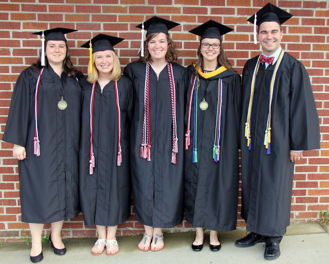 Several graduating history students join together for a photo prior to Union University's spring graduation at the Oman Arena on May 16, 2016. They are: (left to right) Faith Bagley, Hannah Jones, Sarah Carroll, Bree McCuin, and Kenan Keller.