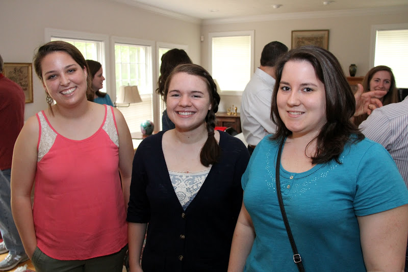 Emily Littleton (left to right), Jordan Sellers, and Faith Bagley take time for a photo at the beginning of the 23rd Annual Phi Alpha Theta/History Department Cookout at Dr. Stephen Carls's home on May 8, 2015.