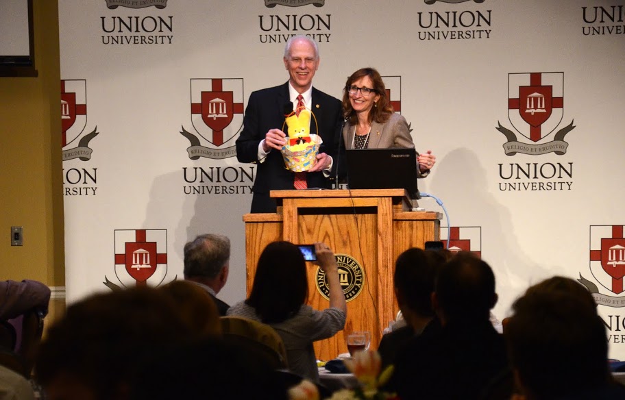 Union's Dr. Stephen Carls stands with Dr. Minoa Uffelman of Austin Peay State University after accepting a specially prepared Peeps basket presented by her on behalf of Austin Peay State's Theta-Delta chapter at the 2016 Tennessee Phi Alpha Theta Regional Conference on April 2.