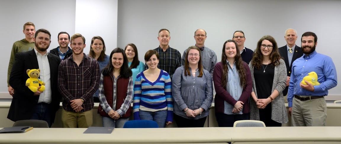Phi Alpha Theta members in attendance at the Delta-Psi chapter's spring plenary meeting on February 22, 2016, pause for a photo. They are: (front row, left to right) Nicholas Hancock, Seth Reid, Alexandra Martin, Kelsea DuVall, Kathryn Mitchell, Lauren Geary, Livvy Winters, and Allen Bradley; (back row, left to right) Stephen Lewoczko, Jeremy Ebert, Emily Littleton, Jordan Sellers, Dr. Henry Allen, Robert Briley, Dr. Keith Bates, and Dr. Stephen Carls. Photo by Elizabeth Wilson