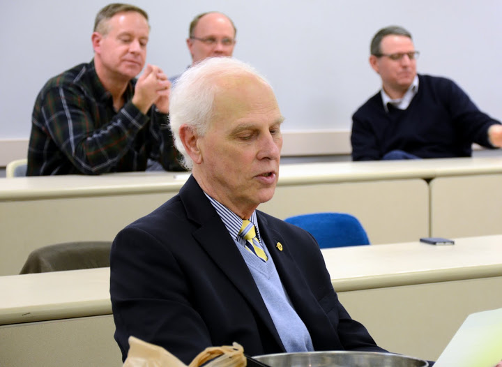 Dr. Stephen Carls reads a congratulatory message to the Phi Alpha Theta spring initiates from Dr. Graydon Tunstall, the society's executive director, on February 22, 2016.