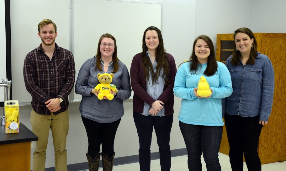 Newly elected officers stand together during the Delta-Psi chapter's spring plenary meeting on February 22, 2016. They are: (left to right) Seth Reid (2016-2017 secretary), Kathryn Mitchell (2016-2017 Kathryn Mitchell), Lauren Geary (2016 spring semester senator), Jordan Sellers (2016-2017 president), and Emily Littleton (2016-2017 senator). Photo by Elizabeth Wilson