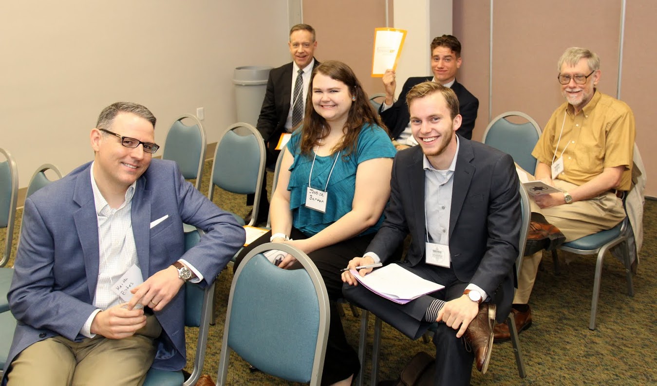 Union University attendees at the Phi Alpha Theta regional conference on April 1, 2017, wait for the panel titled American Frontiers to begin. They are: (front row) Dr. Keith Bates; (second row) Jessica Barton and Seth Reid; (third row, left to right) Dr. Henry Allen, Stephen Lewoczko, and Dr. Terry Lindley.