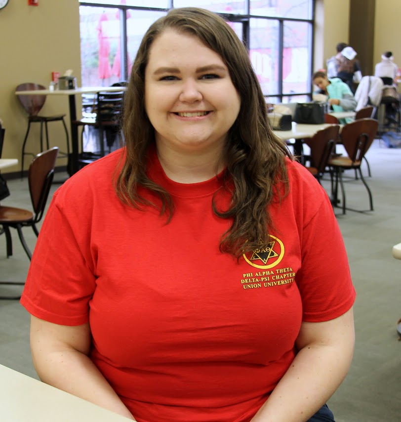 Delta-Psi chapter member Jessica Barton wears her Phi Alpha Theta T-shirt during the history department's spirit day on March 13, 2017.