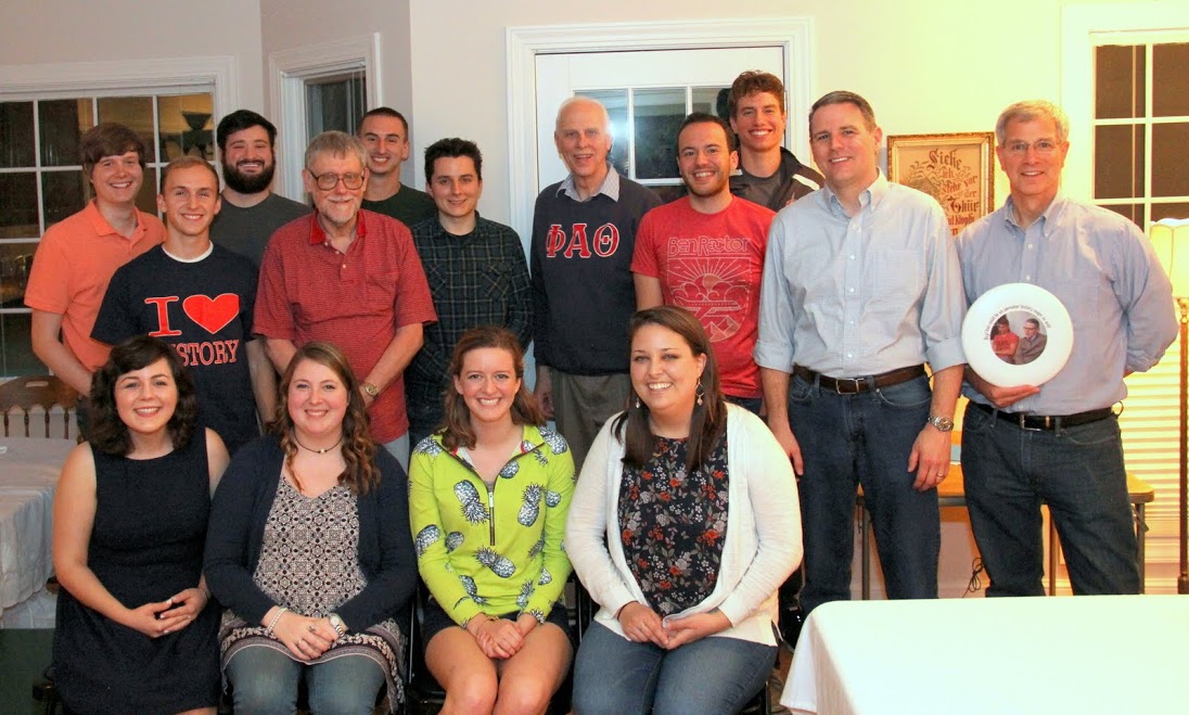 Graduating seniors pose with history department members at the 25th Annual Phi Alpha Theta/History Department Cookout on May 12, 2017. They are: (seated, left to right) Priscilla Porter, Kathryn Mitchell, Beth Adams, and Emily Littleton; (standing, left to right) Thomas Gray, Devin Dean, Luke Parrett, Dr. Terry Lindley, Jeff Williams, Nic Linn, Dr. Stephen Carls, Jeremy Ebert, Stephen Lewoczko, Dr. Keith Bates, and Dr. David Thomas.