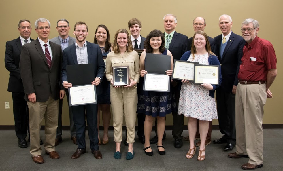 History award winners join with history department faculty for a photo at the department awards Banquet on May 4, 2017. They are: (front row left to right) Dr. David Thomas, Seth Reid, Beth Adams, Priscilla Porter, and Kathryn Mitchell; (back row, left to right) Dr. Henry Allen, Dr. Keith Bates, Emily Littleton, Thomas Gray, Rick Rudesill, Robert Briley, Dr. Stephen Carls, and Dr. Terry Lindley. Photo by Janelle Vest
