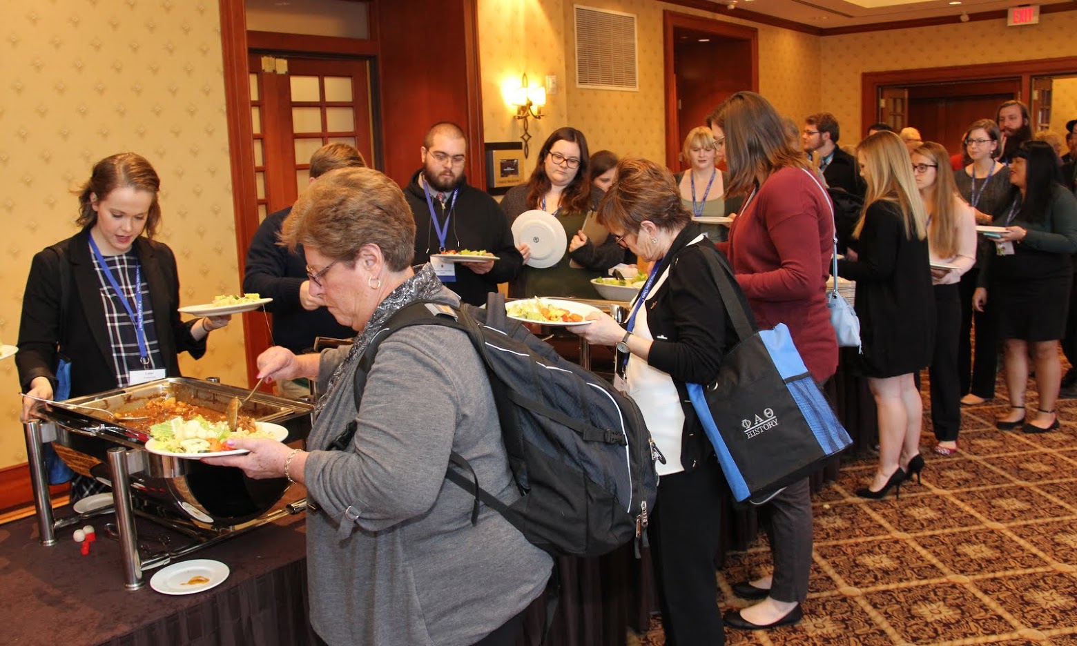 Attendees at the Phi Alpha Theta Biennial Convention go through the lunch buffet line at the InterContinental Hotel in New Orleans on January 4, 2018.