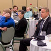 Attendees at the History Department Awards Banquet on May 2, 2019, listen to Dr. Ray Van Neste talk about the importance of history in society as the evening's keynote speaker. Dr. Alice-Catherine Carls is clearly visible at the table on the left, as is Dr. Henry Allen at the table to the right. Photo by Nicole Grim