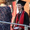 History major Lauren Butler (center) waits to receive her Bachelor of Arts diploma at Union University's undergraduate commencement on May 18, 2019.