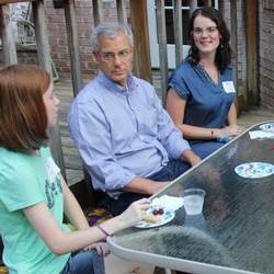 Attendees enjoy food and conversation at the annual History Welcome Reception at the home of Dr. Stephen Carls on September 9, 2019. They are (left to right, going clockwise) Savannah Wright, Dr. David Thomas, Avery Rist, Lillie Salazar, Jack Waters, Robert Briley, and Brenda Briley.