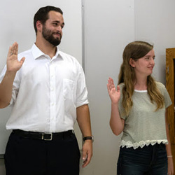 New Phi Alpha Theta members take the membership oath at the Delta-Psi chapter's fall initiation/plenary meeting on September 24, 2019. They are (left to right) Johnna Wade, Nicholas Terra, Rebekah Lisle, and Sandra Allen. Photo by Joey Echeverria