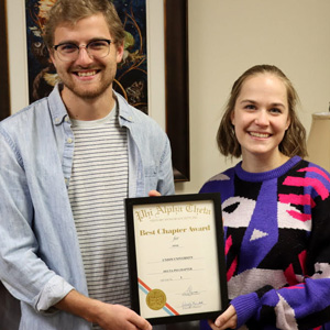 Delta-Psi Chapter President Luke Sower and Vice President Megan Ledbetter hold the 2019 Phi Alpha Theta Best Chapter Award certificate on November 5, 2019. The certificate arrived at Union on October 31.